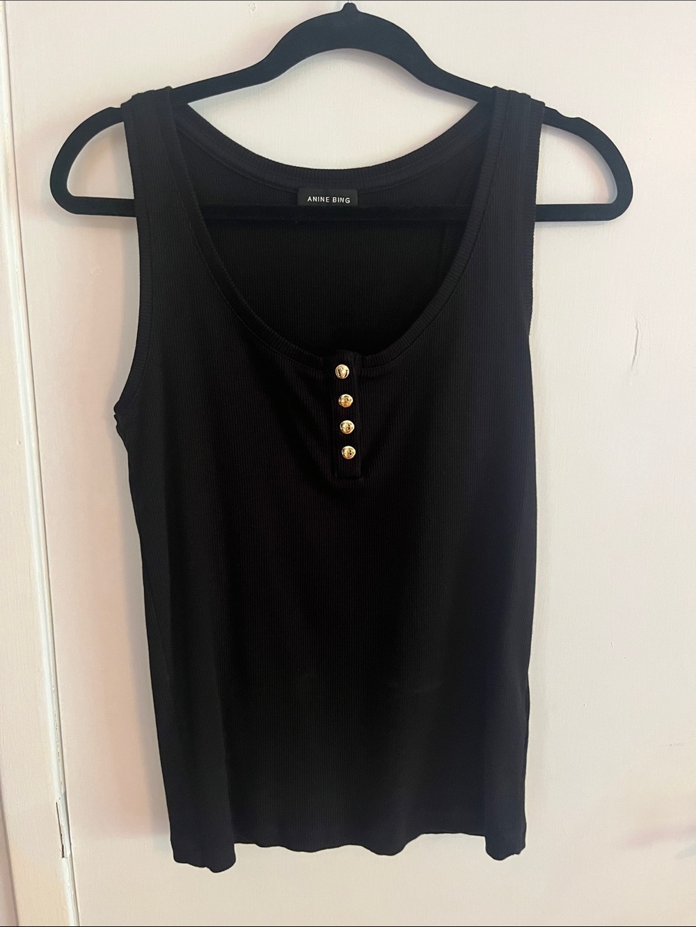Anine Bing black tank top with gold buttons
